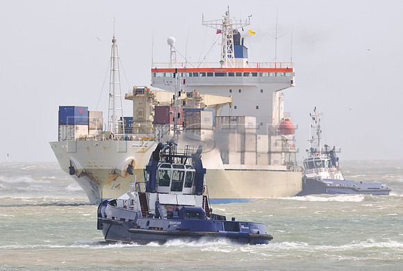 Columbian Star with Tugs