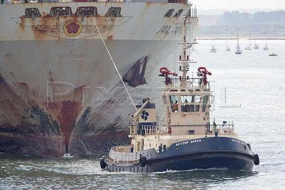 OOCL California with Tug